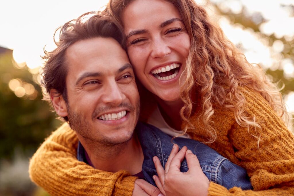 Man and woman smiling