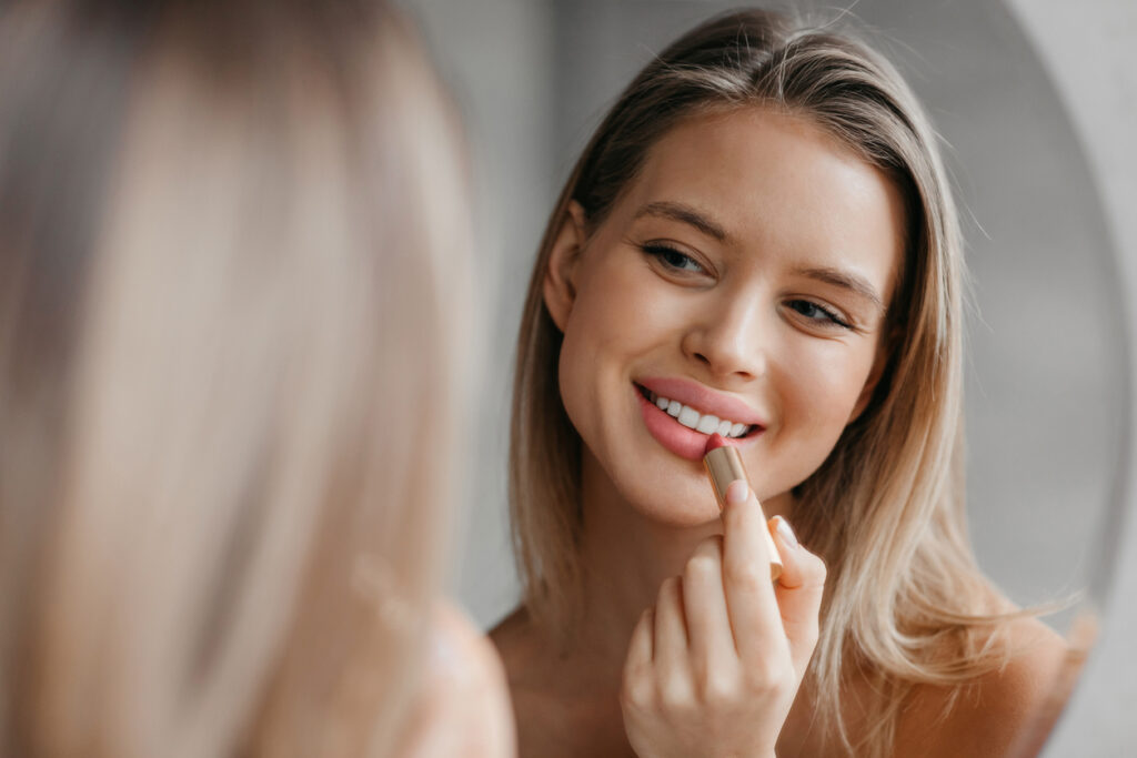 Woman with nude lipstick colour