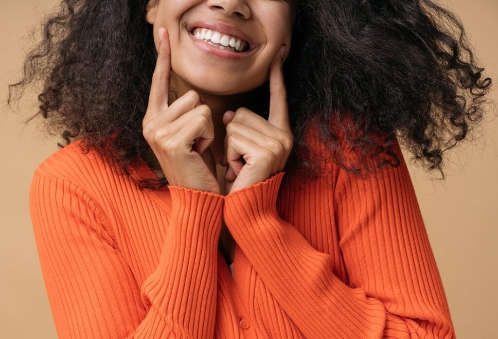 woman with straight teeth without braces